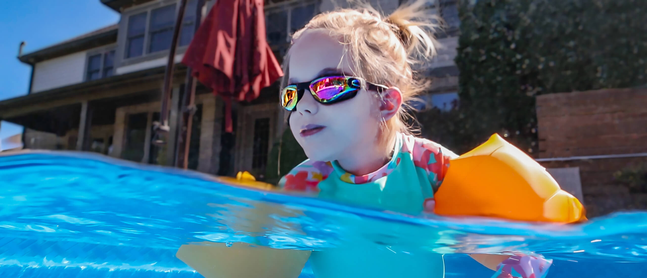 Kendall, diagnosed with NF1 at 10 weeks old, swimming