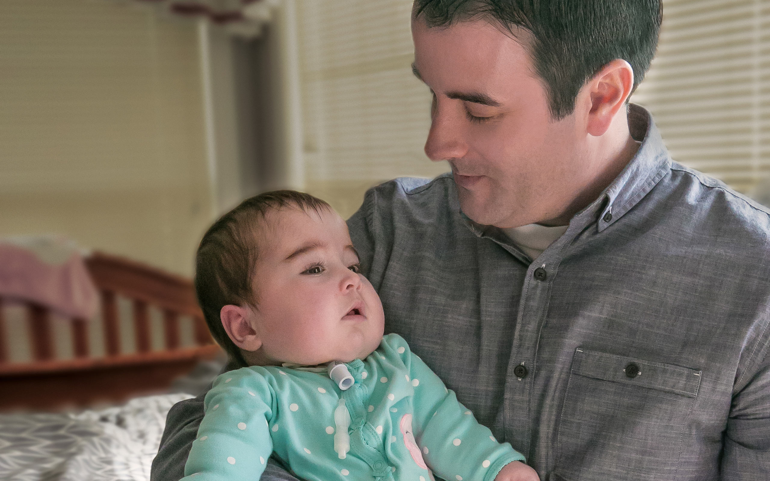 Adelyn, diagnosed with HPP at 2 days old, with her father