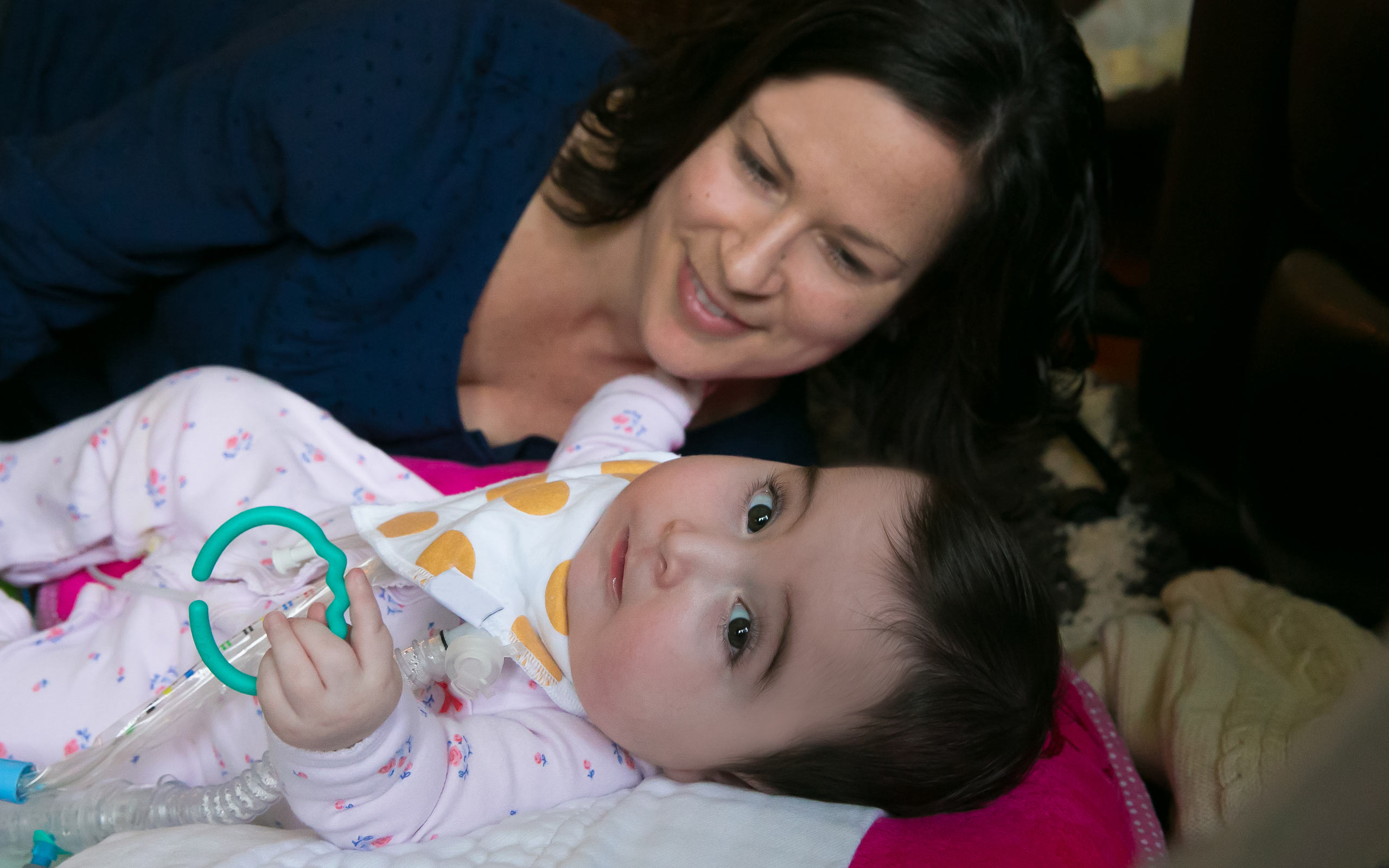 Adelyn, diagnosed with HPP at 2 days old, with her mother