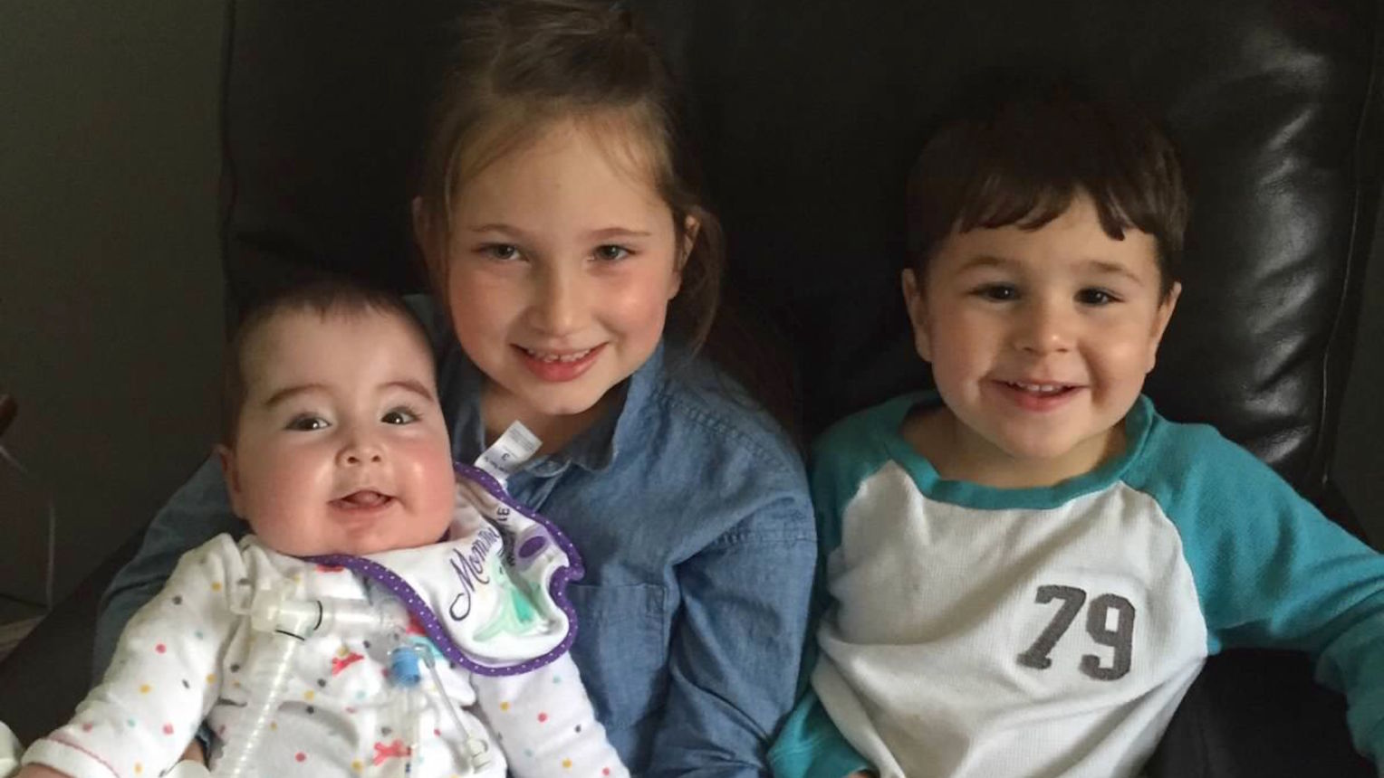 Adelyn with siblings