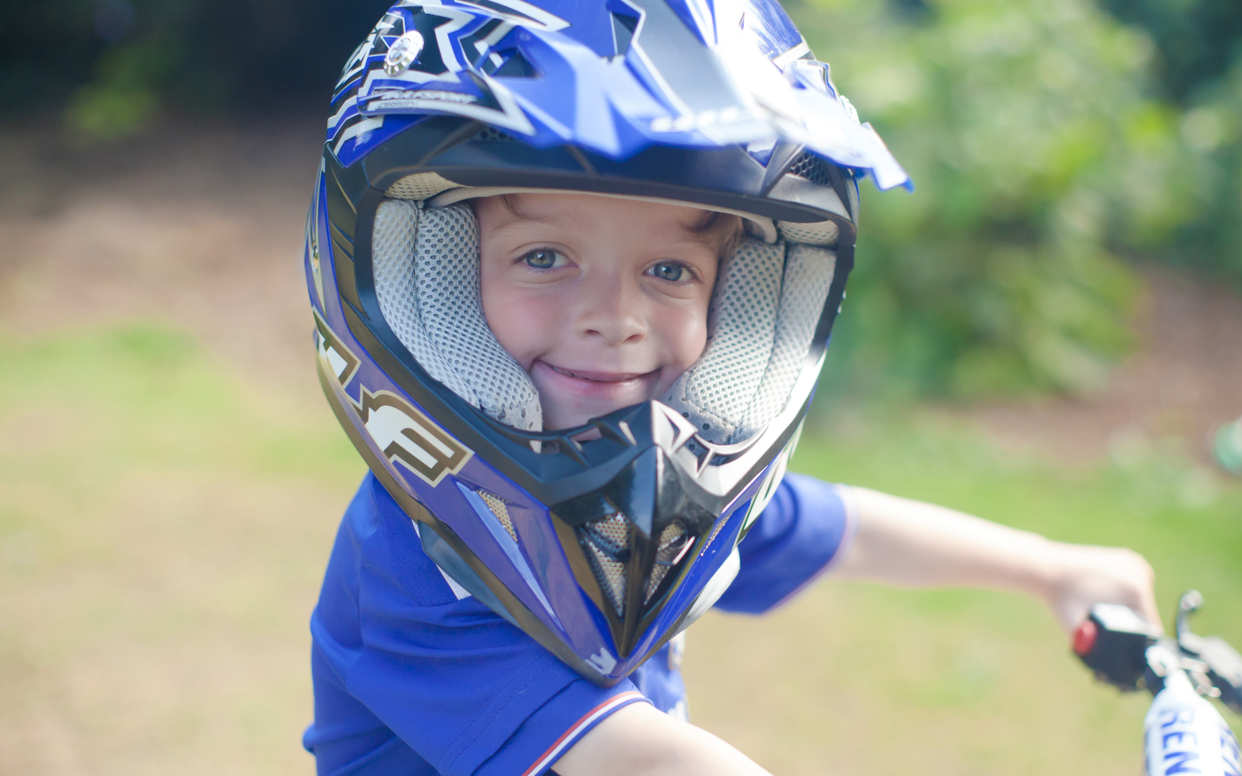 Albie, diagnosed with LAL-D as an infant, riding a bike