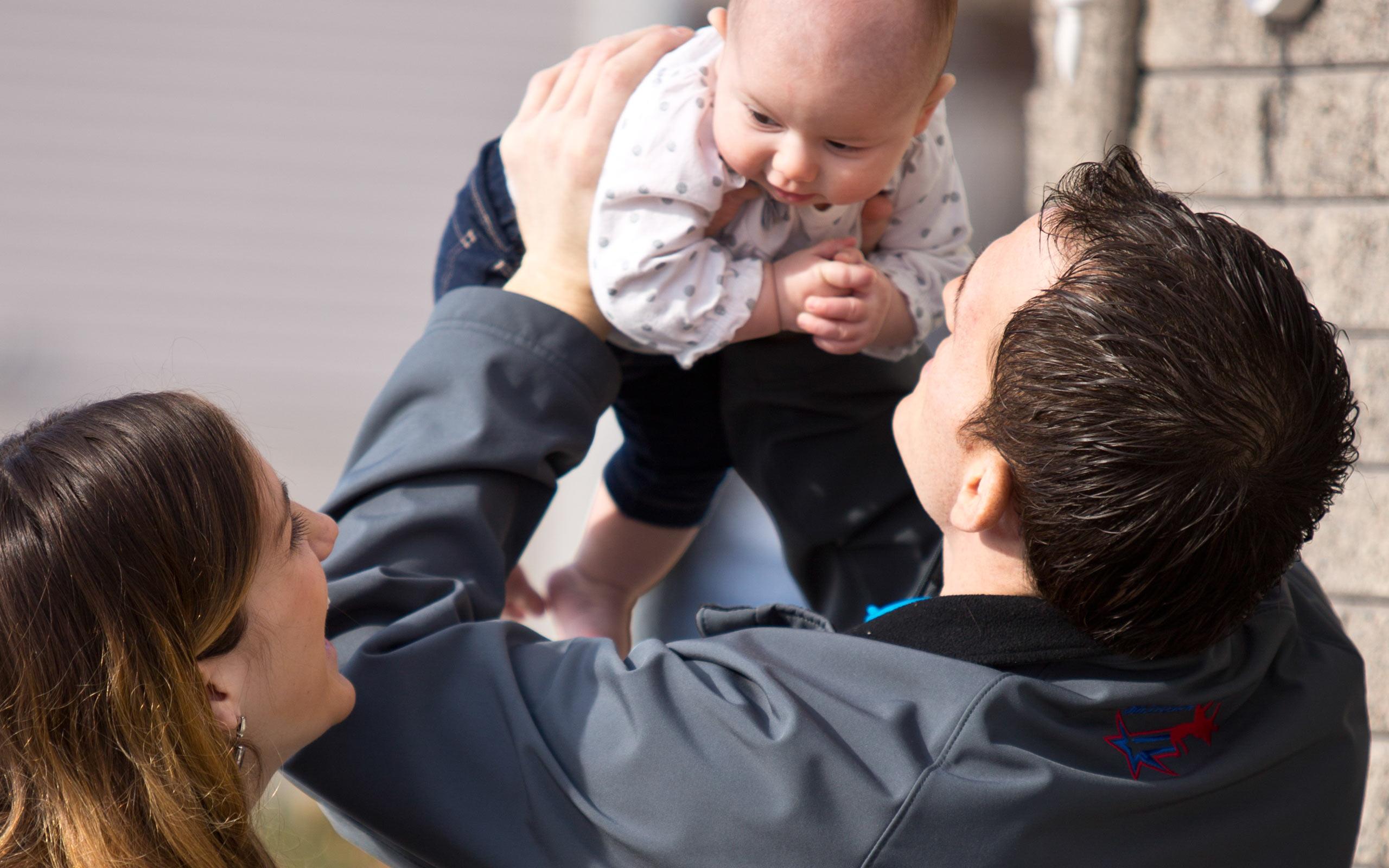 Joe, diagnosed with PNH at 24 years old, with his fiancée and child