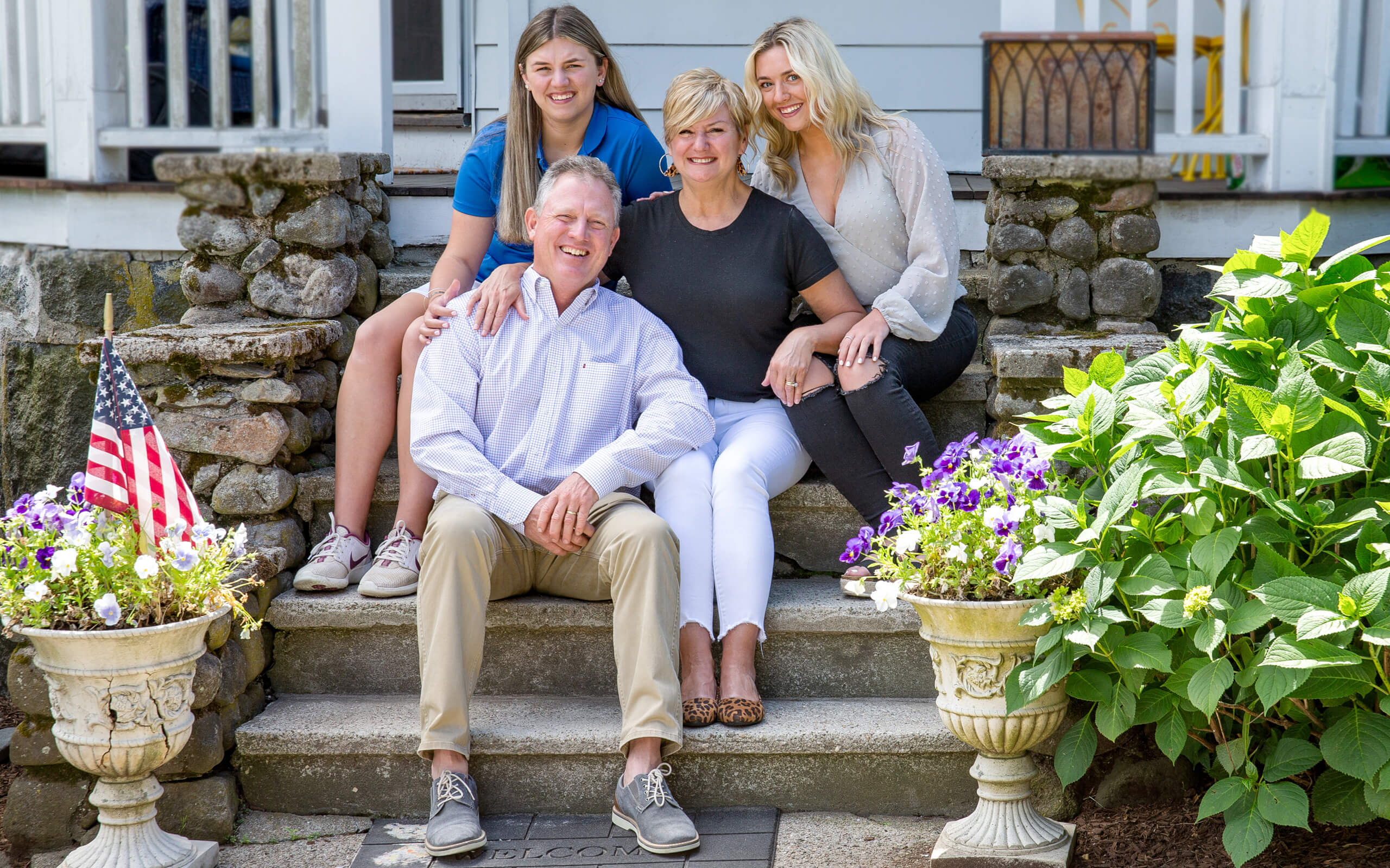 Lauren and Maureen, diagnosed with LAL-D, with their family