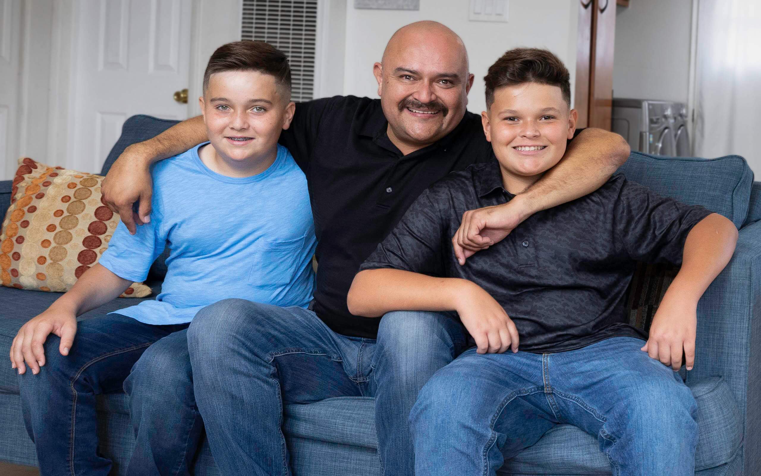 Victor, diagnosed with PNH at 27 years old, in his living room